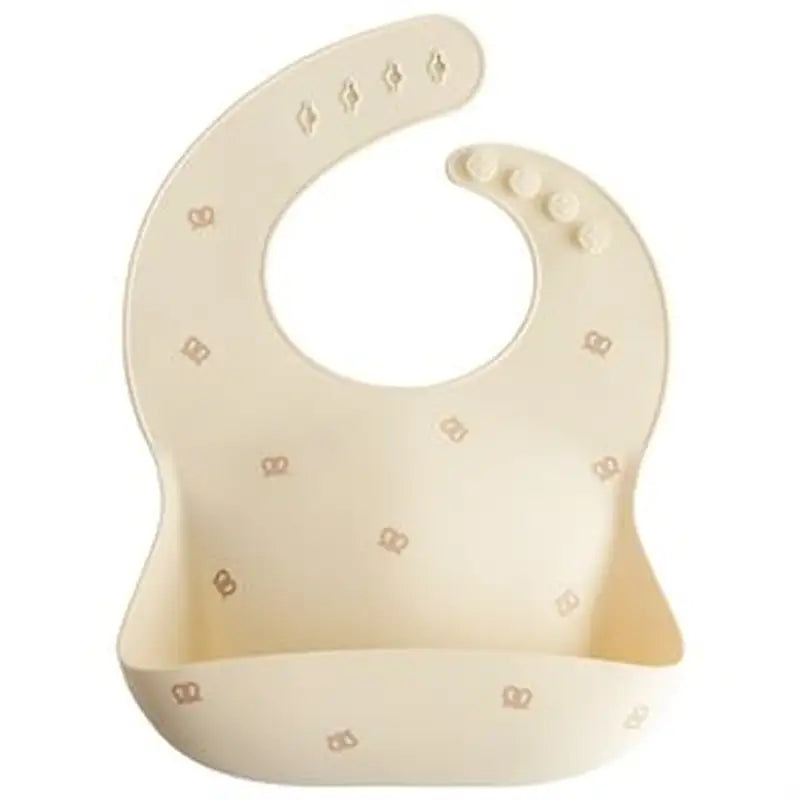 Mushie Silikone Hagesmæk i Pretzel Design - Elegance til Måltider