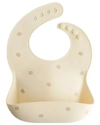 Mushie Silikone Hagesmæk i Pretzel Design - Elegance til Måltider